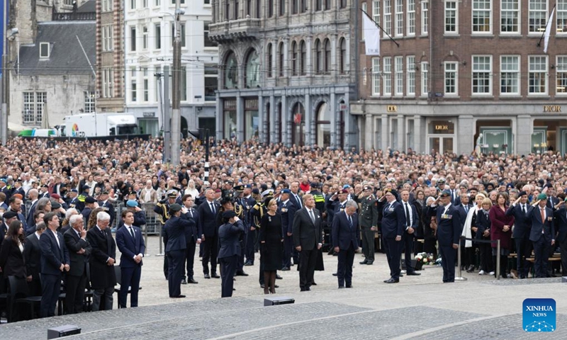 People attend the commemoration ceremony of the National Remembrance Day on Dam Square in Amsterdam, the Netherlands, May 4, 2026. The National Remembrance Day, observed annually on May 4 in the Netherlands, commemorates civilians and members of the armed forces who have lost their lives in wars and peacekeeping missions. (Photo by Sylvia Lederer/Xinhua)