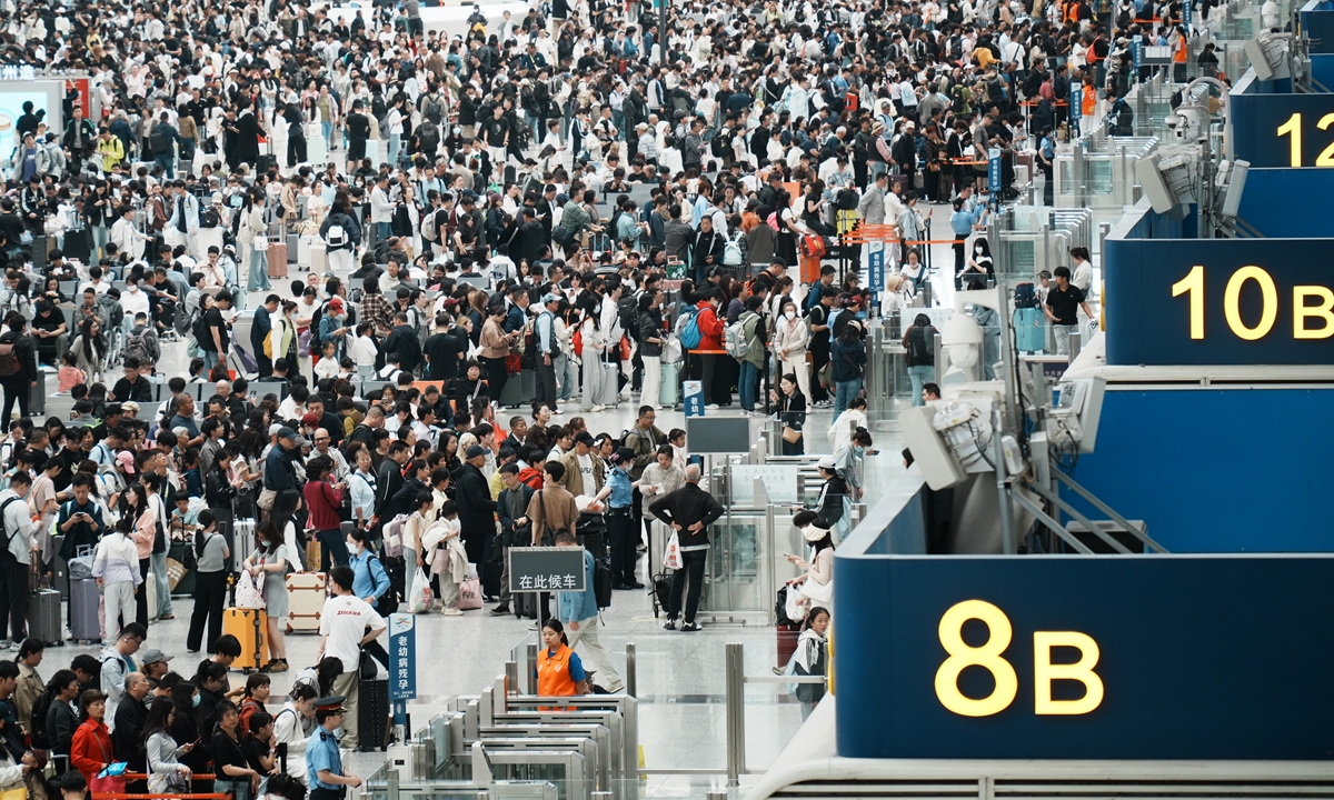 Travelers wait to board high-speed bullet trains at the Hangzhou East Railway Station on May 5, 2026, the last day of the May Day holidays. Photo: VCG