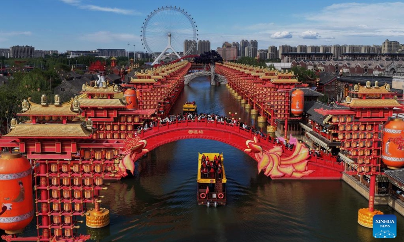 An aerial drone photo taken on May 4, 2026 shows a view of the Hetou Old Street scenic area in Fengnan District, Tangshan, north China's Hebei Province. People headed out to make the most of their leisure time during the May Day holiday in Hebei. The province has embraced innovation in the cultural and tourism sector in recent years to meet varying market demands. (Photo: Xinhua)