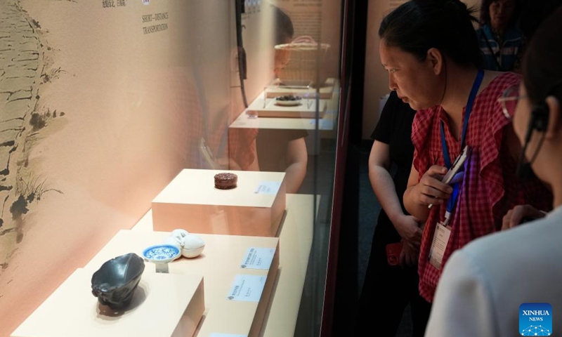 Visitors view exhibits during a Litchi-themed cultural exhibition in Haikou, south China's Hainan Province, May 5, 2026. (Photo: Xinhua)