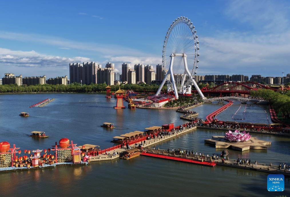 An aerial drone photo taken on May 4, 2026 shows a view of the Hetou Old Street scenic area in Fengnan District, Tangshan, north China's Hebei Province. People headed out to make the most of their leisure time during the May Day holiday in Hebei. The province has embraced innovation in the cultural and tourism sector in recent years to meet varying market demands. (Photo: Xinhua)