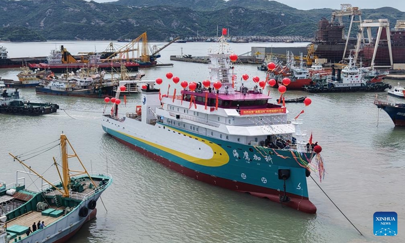An aerial drone photo taken on May 5, 2026 shows China's first privately funded scientific research vessel, R/V Haiying Surveyor, in Wenling, east China's Zhejiang Province. R/V Haiying Surveyor was launched here on Tuesday. The vessel has a total length of 82 meters, a designed full load displacement of 3,500 tonnes, and a cruising range of 10,000 nautical miles. The vessel's backers are 37 fishermen from Wenling. (Photo: Xinhua)