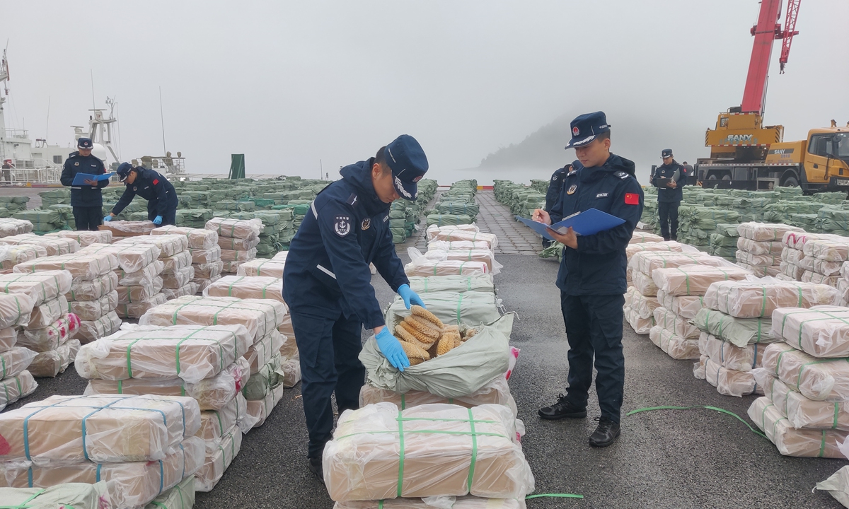 Officers from the Guangxi Coast Guard Bureau seize smuggled frozen products on January 31, 2024. Photo: Courtesy of Guangxi Coast Guard Bureau