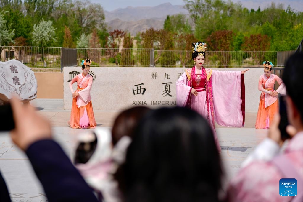 Visitors enjoy an immersive performance at the Xixia Imperial Tombs scenic area during the May Day holiday in Yinchuan, northwest China's Ningxia Hui Autonomous Region, May 5, 2026. (Photo: Xinhua)