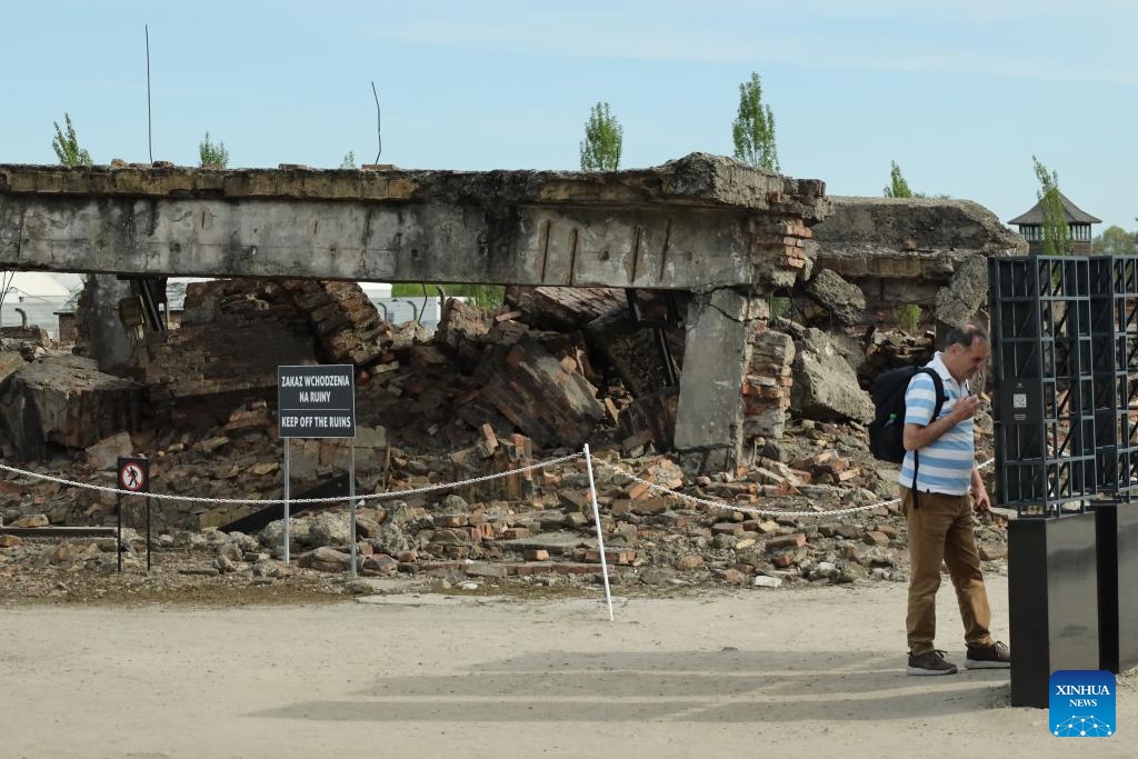 A man visits the site of Auschwitz-Birkenau, Nazi Germany's largest concentration and extermination camp, in Oswiecim, Poland, May 4, 2026. The Germans established the Auschwitz camp in Poland in 1940, initially for the imprisonment of Poles. Auschwitz II-Birkenau was established two years later. At least 1.1 million people were killed at Auschwitz, including Jews, Poles, Romanians, Soviet captives and others. The camp was liberated on Jan. 27, 1945. (Photo: Xinhua)