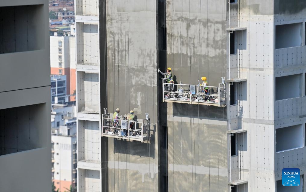 Workers from the China Railway 20th Bureau Group operate at the construction site of an urban village renovation project in Nanning, south China's Guangxi Zhuang Autonomous Region, May 5, 2026. Workers from the China Railway 20th Bureau Group stayed at their posts at multiple construction sites during the May Day holiday to ensure the high-quality and efficient delivery of these projects. (Photo: Xinhua)