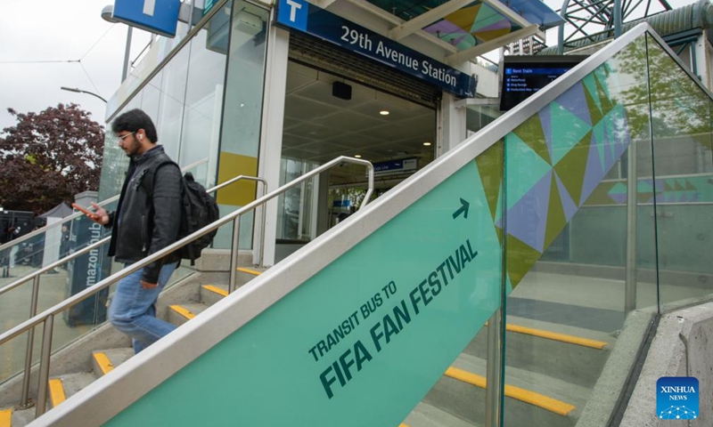 New signage directing transit users to the venue of FIFA Fan Festival is seen outside a SkyTrain station in Vancouver, British Columbia, Canada, on May 6, 2026. The City of Vancouver on Wednesday launched its FIFA World Cup 2026 Know Before You Go campaign to help visitors navigate where to go and how to get there, including accessing matches, events and other destinations during the tournament. (Photo by Liang Sen/Xinhua)

