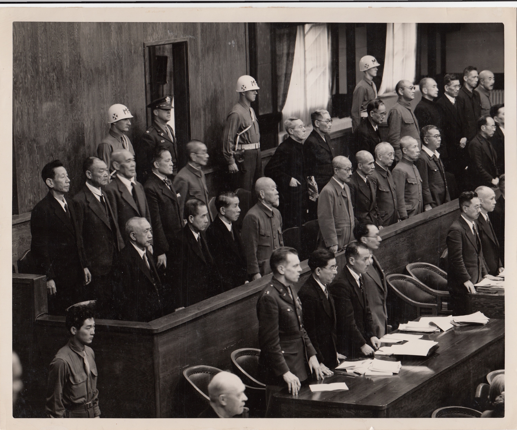 Defendants stand up as the judges enter the courtroom on May 3, 1946. Photo: Courtesy of Database of the Tokyo Trials Literature, Shanghai Jiao Tong University