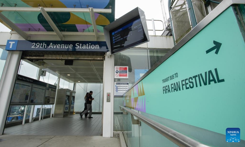 New signage directing transit users to the venue of FIFA Fan Festival is seen outside a SkyTrain station in Vancouver, British Columbia, Canada, on May 6, 2026. The City of Vancouver on Wednesday launched its FIFA World Cup 2026 Know Before You Go campaign to help visitors navigate where to go and how to get there, including accessing matches, events and other destinations during the tournament. (Photo by Liang Sen/Xinhua)

