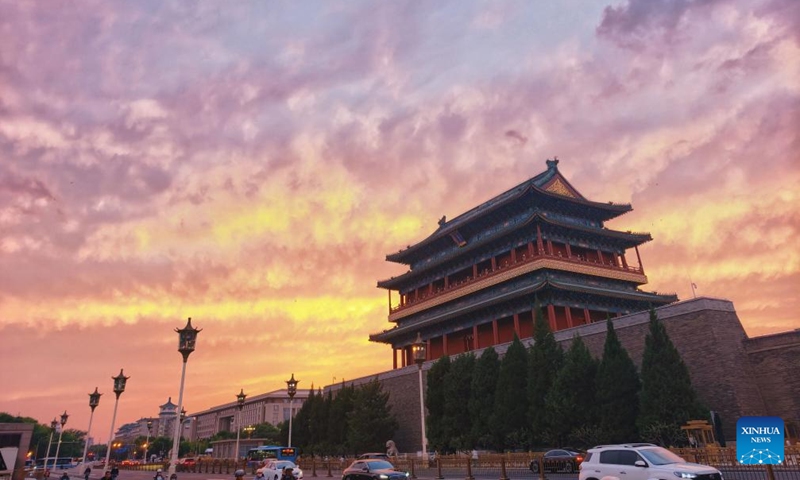 This photo taken on May 6, 2026 shows a view of the sunset glow in Beijing, capital of China. (Photo by Wang Junfeng/Xinhua)