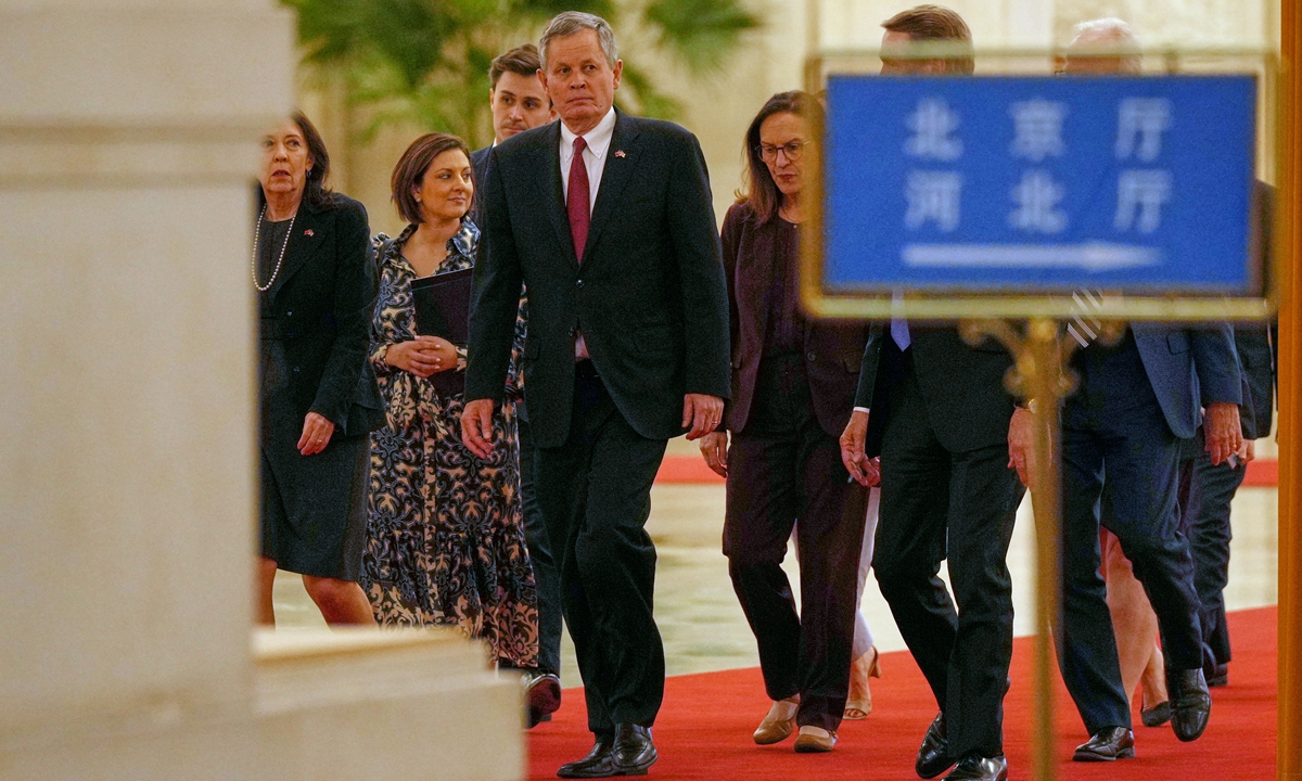 US Senator Steve Daines walks with his congressional delegation as they arrive to the Great Hall of the People to meet with Chinese Foreign Minister Wang Yi, in Beijing, on May 7, 2026. Photo: VCG