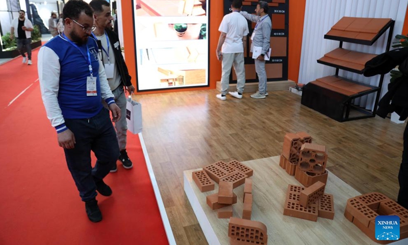 Visitors view construction materials at the 28th International Exhibition for Construction, Building Materials and Public Works (Batimatec) in Algiers, Algeria, on May 6, 2026. Held from May 3 to 7, the 28th Batimatec showcases developments in construction materials, machinery, and smart technologies, emphasizing sustainable and green building solutions. (Xinhua)

