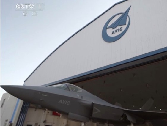 A J-35 stealth fighter jet bearing the number 0001 taxis out of a hangar in a CCTV News program. Photo: Screenshot from CCTV News