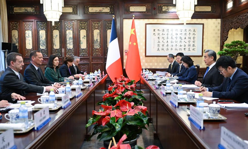 Wang Yi, a member of the Political Bureau of the Communist Party of China Central Committee and director of the Office of the Central Commission for Foreign Affairs, holds talks with Emmanuel Bonne, diplomatic adviser to the French president, in Beijing, capital of China, May 8, 2026. (Xinhua/Dai Tianfang)

