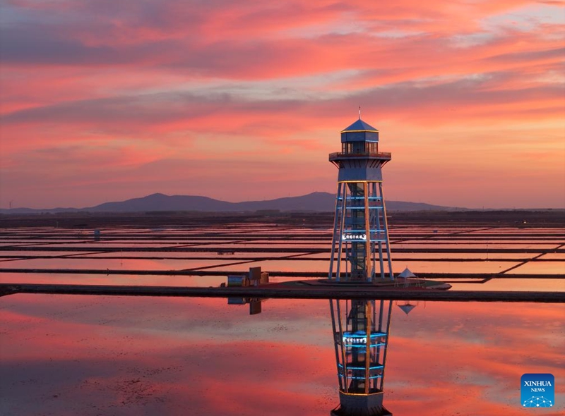 An aerial drone photo taken on May 9, 2026 shows sunset glow at a park in Fujin, northeast China's Heilongjiang Province. (Photo by Qu Yubao/Xinhua)