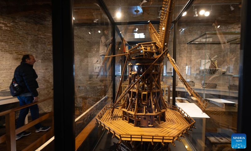 Visitors view exhibits at the De Valk windmill in Leiden, the Netherlands, on May 9, 2026. Dutch National Mill Day is celebrated annually on the second weekend of May, when windmills and watermills across the Netherlands open to the public. Visitors can enjoy guided tours, live demonstrations, and spinning sails, celebrating the country's rich milling heritage. (Photo by Sylvia Lederer/Xinhua)