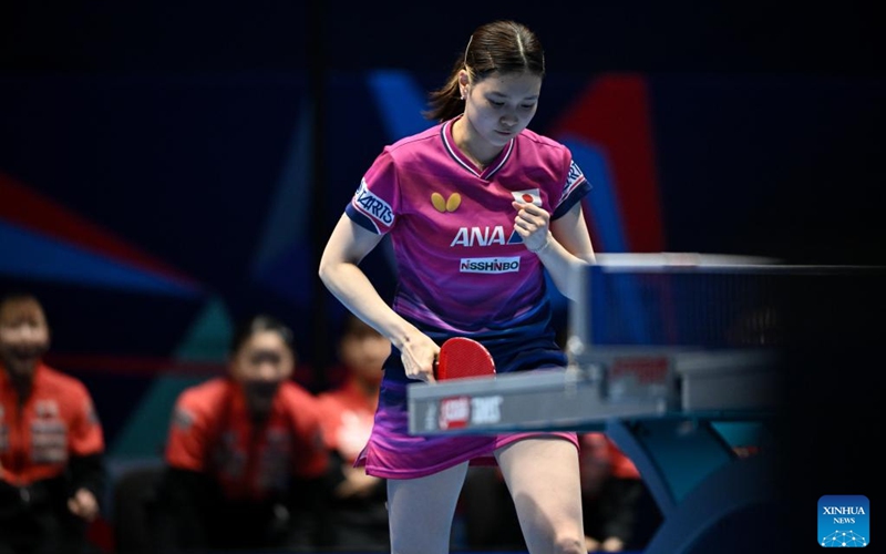 Hashimoto Honoka of Japan celebrates scoring in the singles match against Nina Mittelham of Germany during the women's teams semifinal match between Germany and Japan at the ITTF World Team Table Tennis Championships Finals in London, Britain, on May 9, 2026. (Xinhua/Lian Yi)
