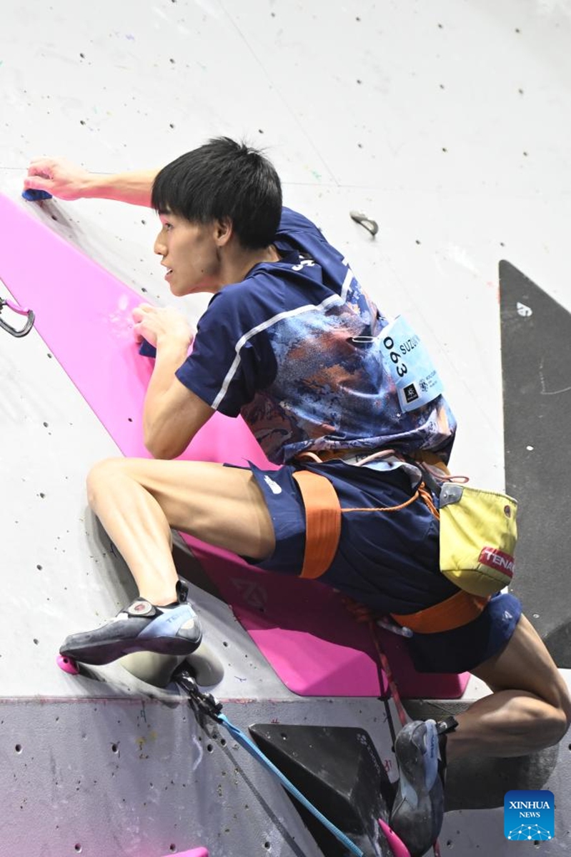 Suzuki Neo of Japan competes during the men's lead final at World Climbing Series Wujiang 2026 in Suzhou, east China's Jiangsu Province, May 9, 2026. (Photo by Wang Xuzhong/Xinhua)