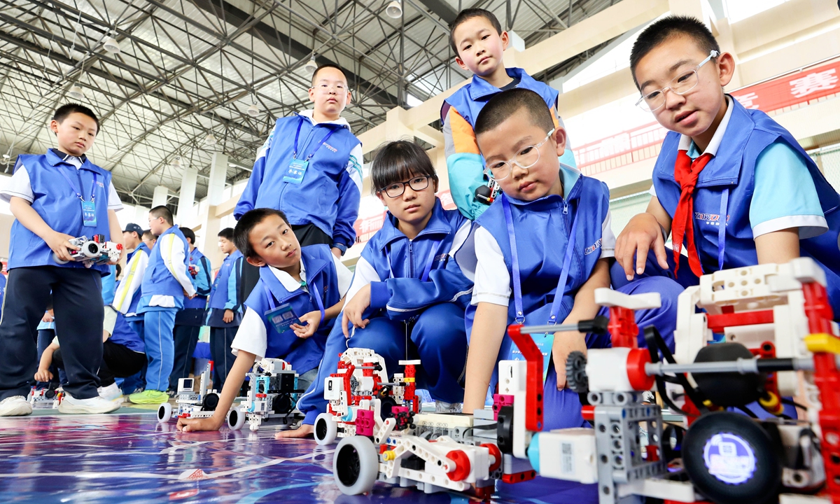 A group of participants take part in a youth artificial intelligence (AI) and robotics competition in Zhangye, Northwest China's Gansu Province on May 10, 2026. China's core AI industry was valued at more than 1.2 trillion yuan ($176.45 billion) in 2025, according to the Xinhua News Agency. Photo: VCG