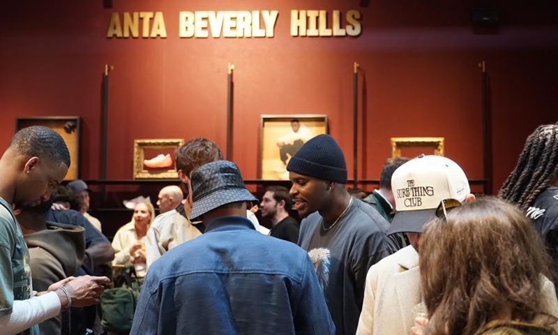 People attend the opening ceremony of Anta's first North American flagship store in Beverly Hills, California, the United States, Feb. 13, 2026. (Photo by Zeng Hui/Xinhua)