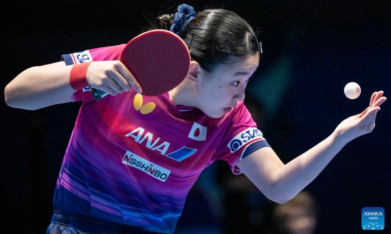 Harimoto Miwa of Japan serves in the singles match against Han Ying of Germany during the women's teams semifinal match between Germany and Japan at the ITTF World Team Table Tennis Championships Finals in London, Britain, on May 9, 2026. (Photo by Stephen Chung/Xinhua)