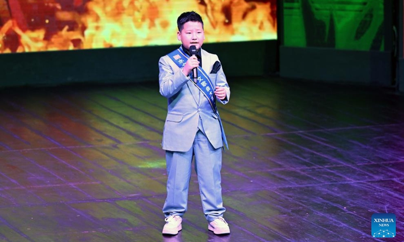 A contestant sings during a Chinese song competition in Islamabad, capital of Pakistan on May 8, 2026. The Pakistan finals of the Water Cube Cup Chinese song competition were held here on Friday to celebrate the 75th anniversary of diplomatic ties between China and Pakistan. (Xinhua/Ahmad Kamal)