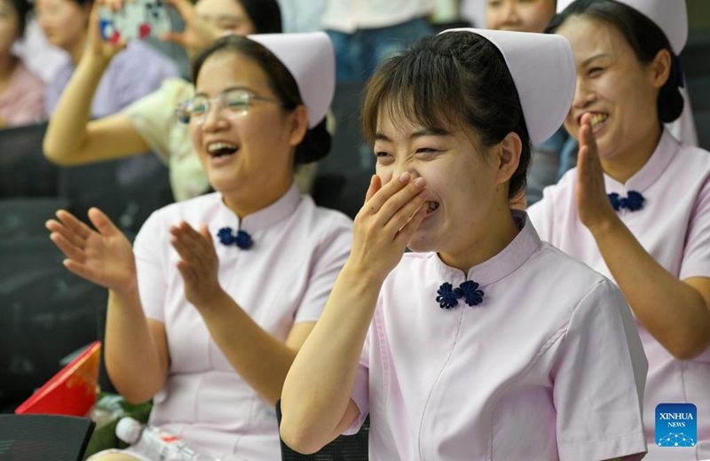 Nurses watch a performance during International Nurses Day celebrations at Beijing Massage Hospital in Beijing, capital of China, May 9, 2026. Beijing Massage Hospital held a series of events on Saturday to celebrate the upcoming International Nurses Day, which falls on May 12. (Xinhua/Chen Shuo)