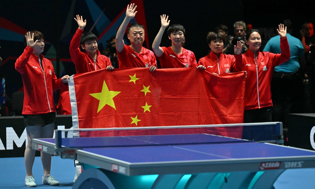 The Chinese women's national table tennis team celebrate after beating Japan in the women's teams final at the ITTF World Table Tennis Championships Finals in London, the UK, on May 10, 2026. With a 3-2 victory, China claimed its seventh straight women's title at the tournament. It also marked a record-extending 24th time that China has lifted the Corbillon Cup, with its latest title run beginning from 2012 in Dortmund, Germany. Photo: VCG