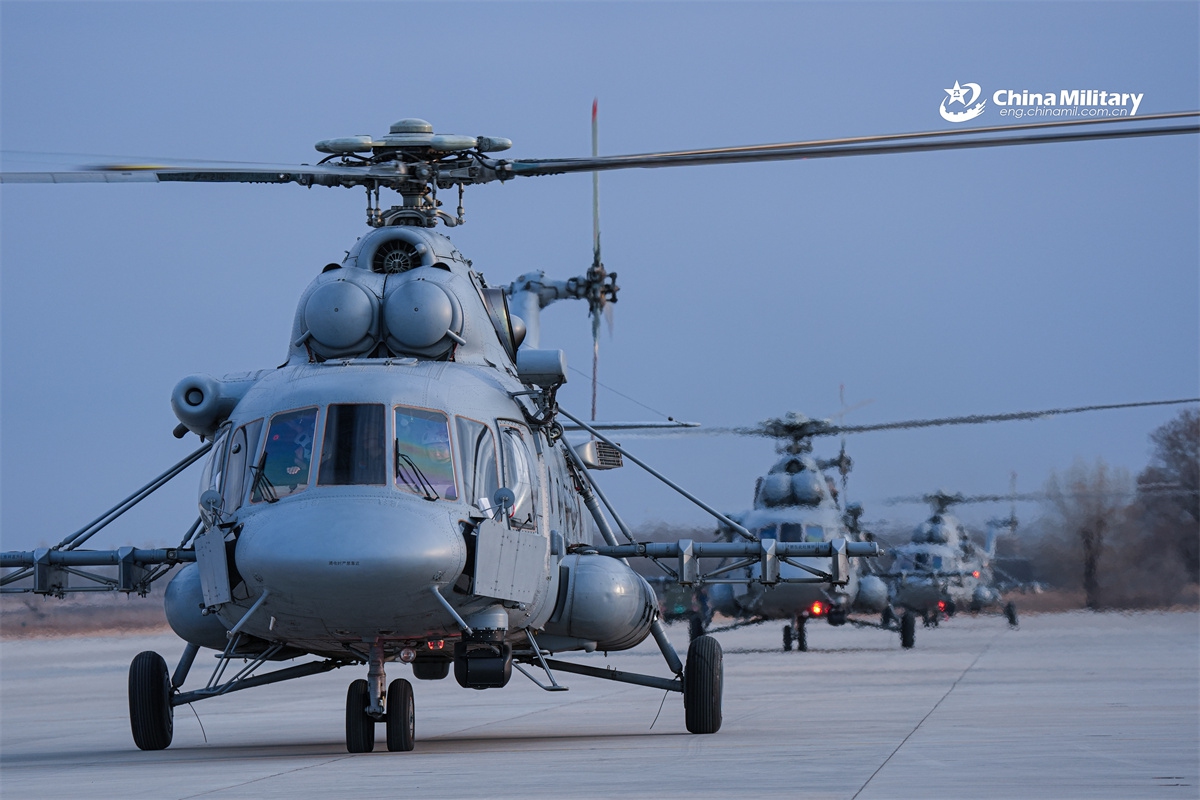 Mi-171Sh military transport helicopters attached to a search and rescue aviation brigade of the air force under the Chinese PLA Northern Theater Command stand by for takeoff during a Combat Search and Rescue (CSAR) training exercise. (Photo: eng.chinamil.com.cn)