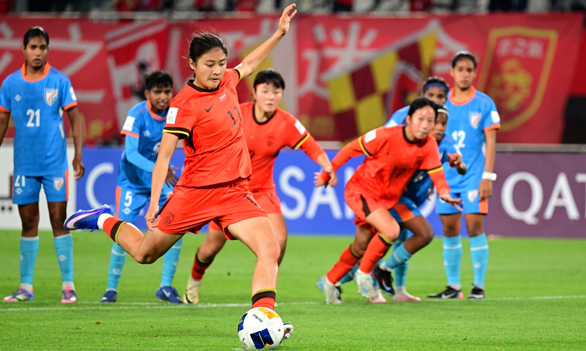 Chinese football player Liu Yuxi scores from the penalty spot in the quarterfinal match at the AFC U17 Women's Asian Cup in Suzhou, East China's Jiangsu Province on May 11, 2026. The Chinese team advanced to the semifinals with a 3-0 victory and secured a berth in the 2026 FIFA U17 Women's World Cup to be held in Morocco from October 17 to  November 7. Photo: VCG