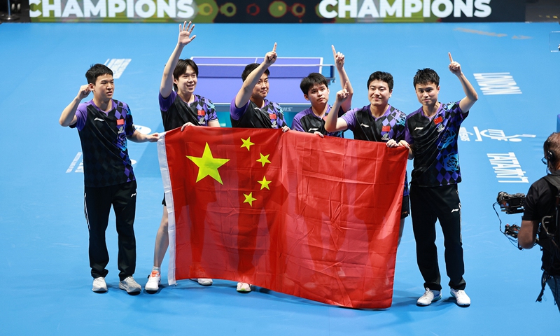 China defeats Japan to retain men's team crown at ITTF World Championships, completes double triumph in London