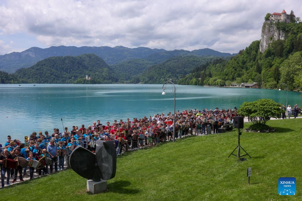 Participants play the accordion during the accordion weekend event at Lake Bled in Bled, Slovenia, May 10, 2026. This annual event brings together hundreds of participants for band performances, ensemble shows and an accordion procession. (Photo: Xinhua)