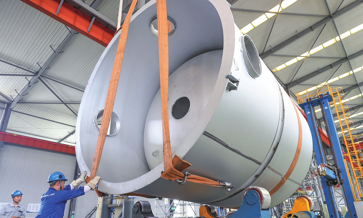 Workers assemble air separation units for export to Malaysia and Kuwait at the workshop of Yingde Gases in Deqing, East China's Zhejiang Province, on May 12, 2026.  The batch of air separation units is destined for export shipment to Malaysia and Kuwait. Photo: VCG