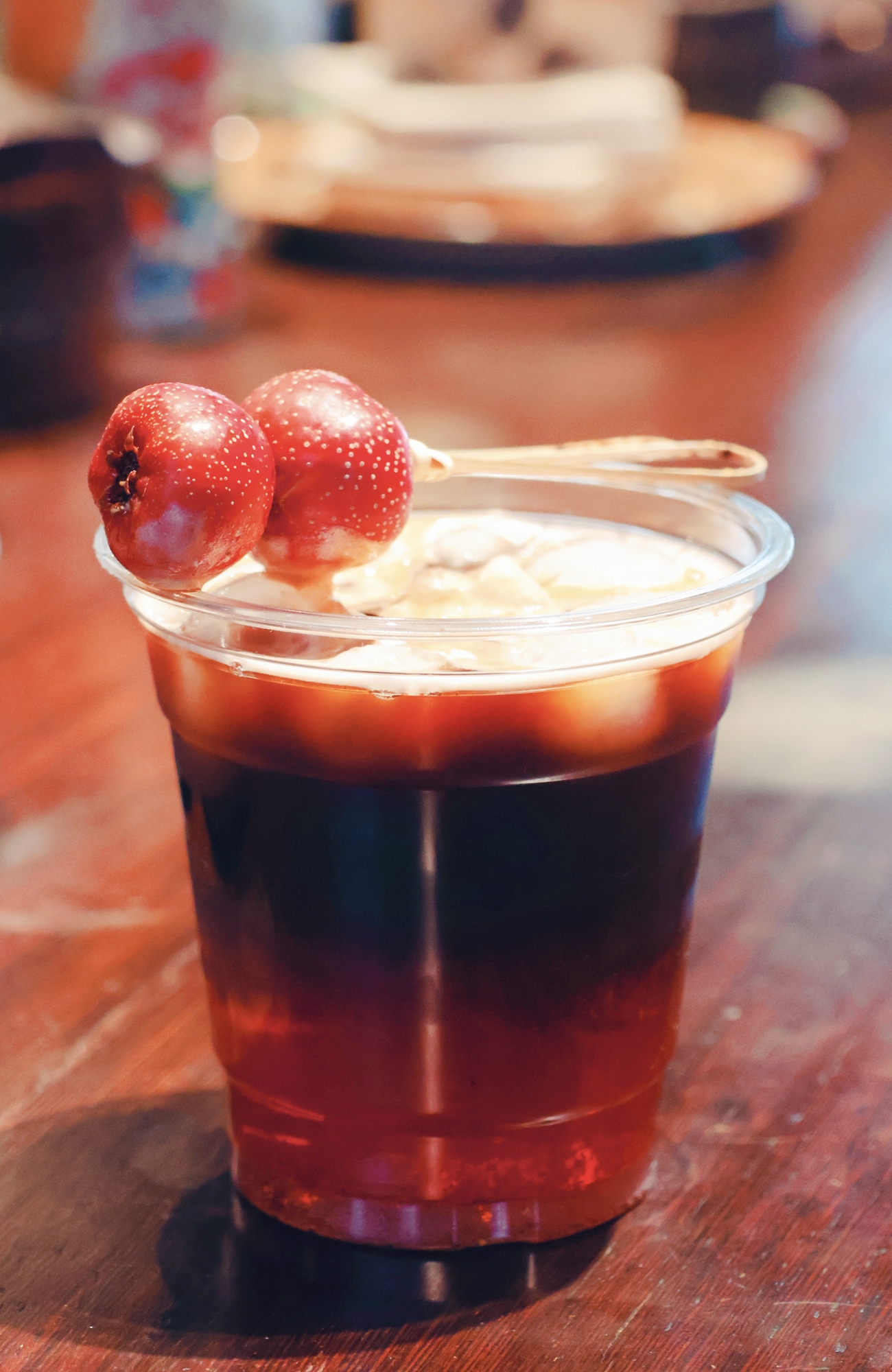 A cup of sugar-coated hawthorn flavored coffee Photo: VCG