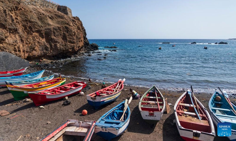 This photo taken on May 11, 2026 shows painted fishing boats on the seaside of Cidade Velha, Santiago Island, Cape Verde. Santiago Island, located in the southern part of the Cape Verde archipelago, is the country's largest and most populous island. (Xinhua/Xie Jianfei)