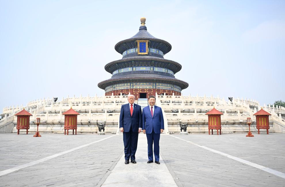 Chinese President Xi Jinping and U.S. President Donald Trump have a photo taken in front of the Hall of Prayer for Good Harvests while visiting the Temple of Heaven in Beijing, capital of China, May 14, 2026. (Photo: Xinhua)