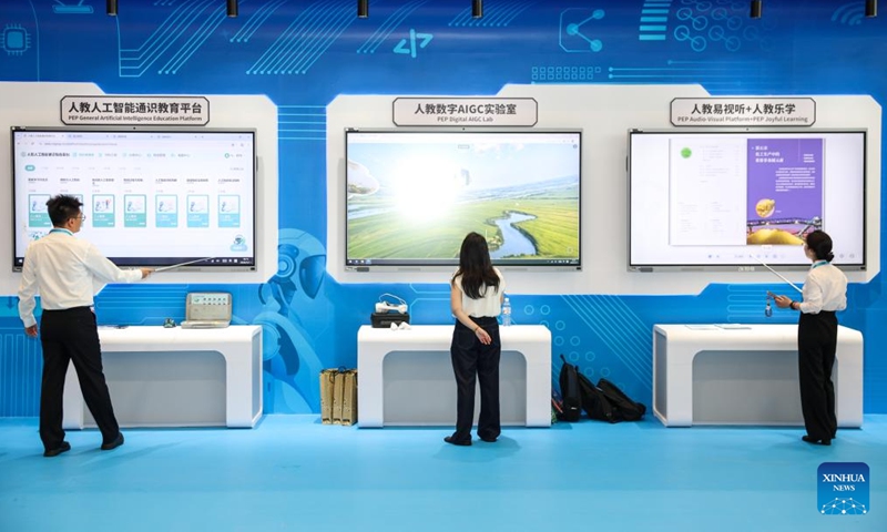 Exhibitors demonstrate products at an exhibition on achievements of global digital education held during the 2026 World Digital Education Conference in Hangzhou, east China's Zhejiang Province, May 11, 2026.

The 2026 World Digital Education Conference kicked off here on Monday. Themed on AI+Education: Transformation Development Governance, this year's conference seeks to explore how AI can drive systemic educational transformation and promote high-quality educational development. An exhibition on achievements of global digital education is held during the conference. (Xinhua/Jiang Han)