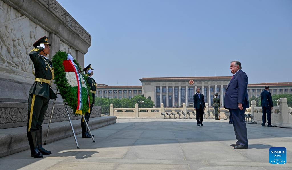 Tajikistan's President Emomali Rahmon lays a wreath at the Monument to the People's Heroes on Tian'anmen Square in Beijing, capital of China, May 12, 2026. (Xinhua/Cai Yang)

