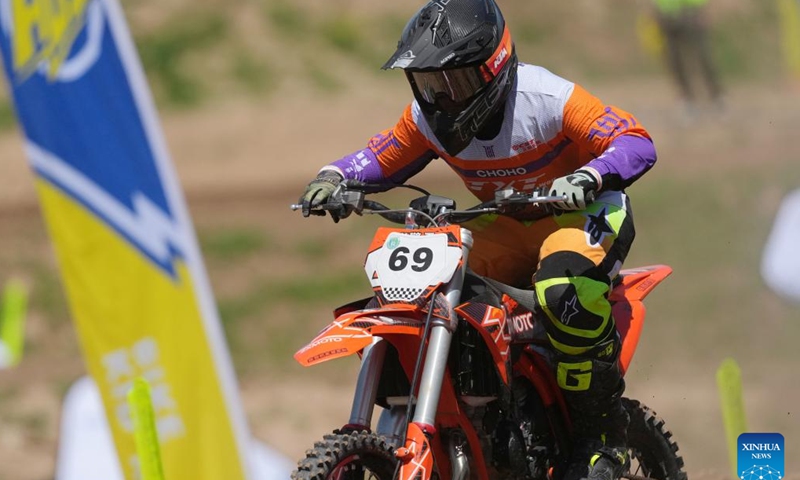 Zhang Qingtian is seen during a motocross league event held in the Xixian New Area of northwest China's Shaanxi Province, May 4, 2026. (Xinhua/Li Yibo)

