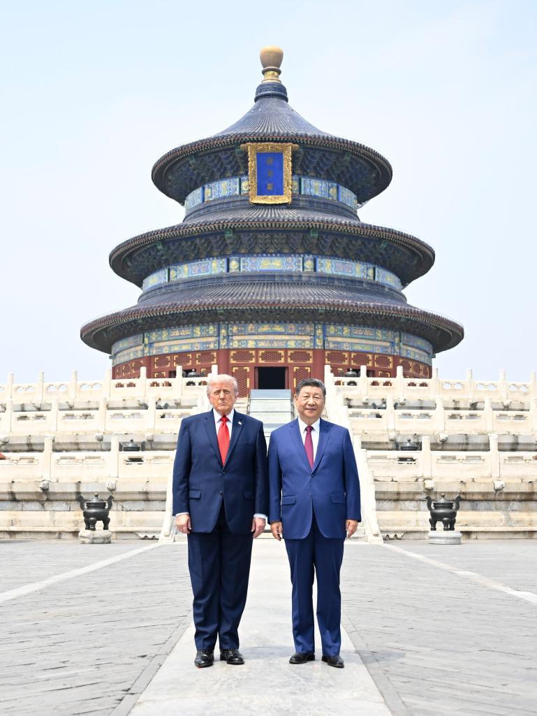 Chinese President Xi Jinping and U.S. President Donald Trump have a photo taken in front of the Hall of Prayer for Good Harvests while visiting the Temple of Heaven in Beijing, capital of China, May 14, 2026. (Photo: Xinhua)