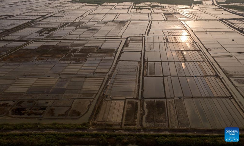 An aerial drone photo taken on May 12, 2026 shows salt pans at Rawaurip village, Cirebon Regency, West Java province, Indonesia. (Xinhua/Veri Sanovri)

