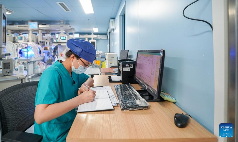 A nurse records data of neonatal patients at the neonatology department of the First People's Hospital of Yunnan Province in Kunming, southwest China's Yunnan Province, May 10, 2026. As the neonatal nurses in the First People's Hospital of Yunnan Province, Yang Limei and her colleagues' routine work is to take care of the newborns suffering with critical illness like premature birth, asphyxia, congenital diseases or severe infections.

