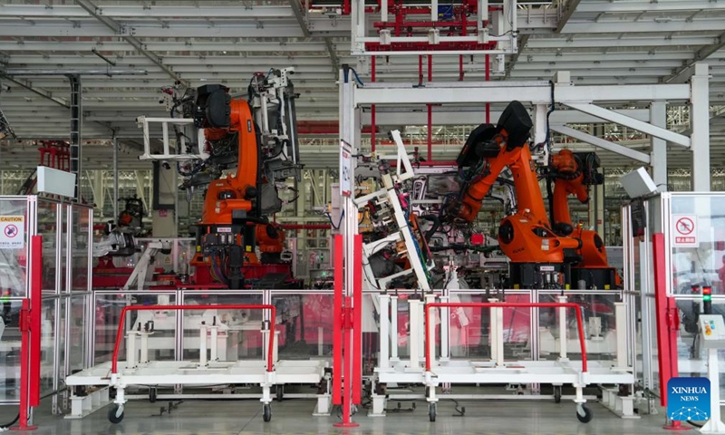 Industrial robots are pictured at an industrial park of Sany, China's leading heavy equipment manufacturer, in Changsha, central China's Hunan Province, May 12, 2026. Stepping into an intelligent heavy truck industrial park of Sany in Changsha, Hunan Province, one can see a bustling scene on the intelligent production lines. (Xinhua/Xue Yuge)