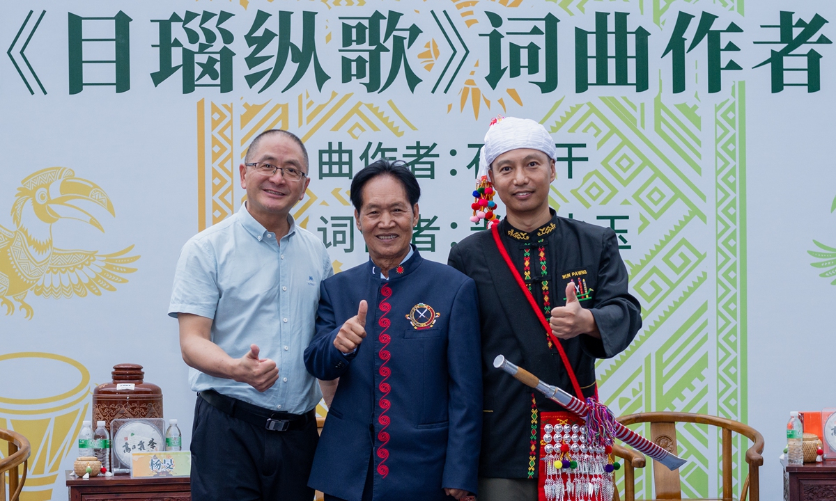 Musicians Zhen Zhen (right) and Shi Legan (middle) pose for a photo with local official Yang Min in Dehong, Yunnan Province on May 1, 2026. Photo: Courtesy of Zhen Zhen 