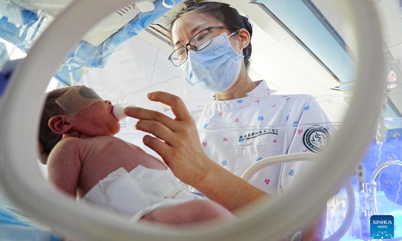 A nurse works at the neonatal ward of a hospital in Hengyang City, central China's Hunan Province, May 12, 2026. International Nurses Day falls annually on May 12. (Photo by Cao Zhengping/Xinhua)

