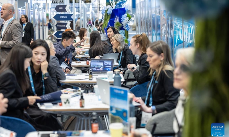 People communicate at the 46th Australian Tourism Exchange (ATE) in Adelaide, Australia, May 11, 2026. From May 10 to 14, the 46th ATE, hosted by Tourism Australia, brought together global buyers and Australian sellers in the tourism industry. (Tourism Australia/Handout via Xinhua)
