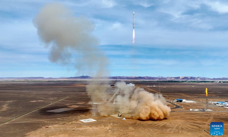 A Zhuque-2E Y5 carrier rocket blasts off from the Dongfeng commercial space innovation pilot zone in northwest China, May 14, 2026. China on Thursday successfully launched a Zhuque-2E Y5 carrier rocket into space from the Dongfeng commercial space innovation pilot zone in northwest China. The carrier rocket blasted off at 11:00 a.m. (Beijing Time) and the second stage of the rocket entered its preset orbit, marking a successful flight mission. (Photo by Wang Jiangbo/Xinhua)