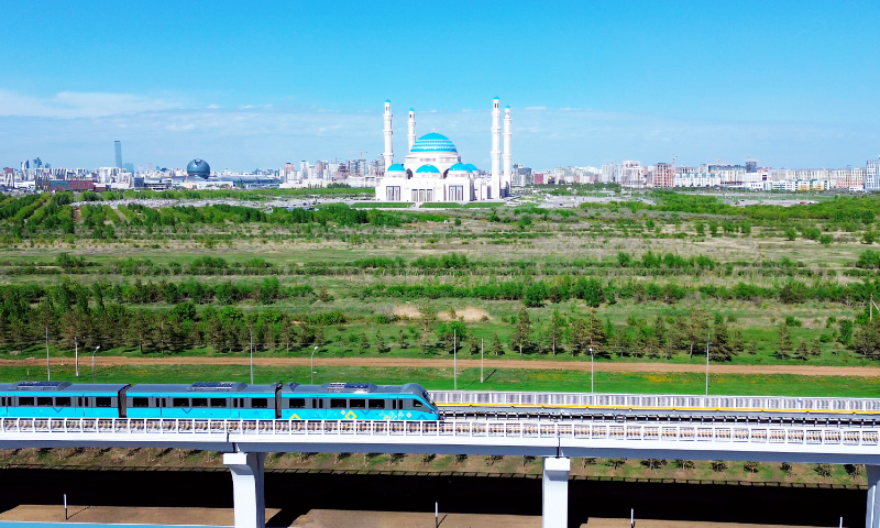 Photo taken on May 16, 2026, show a train of the first phase of the Astana Light Rail project runs in Astana, the capital city of Kazakhstan. The project officially began operation on May 16,  marking the launch of Central Asia's first urban light rail system, with a subsidiary of China State Construction Engineering Co (CSCEC) serving as the project's main contractor. Photo: Courtesy of CSCEC