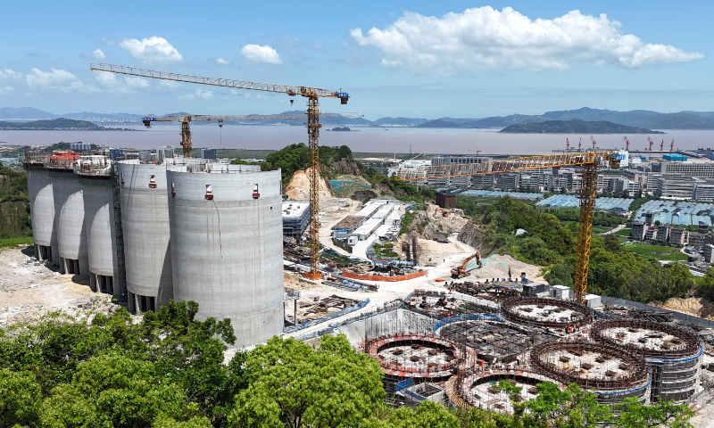 A photo taken on May 18, 2026 shows the construction site of a local grain reserve warehouse project in Yueqing, East China's Zhejiang Province. Shallow round silos with a total storage capacity of 118,000 tons are to be built, as well as a rice-processing plant with a daily capacity of 300 tons. Upon completion, the warehouse will adopt intelligent control systems to reduce grain loss and improve efficiency. Photo: VCG