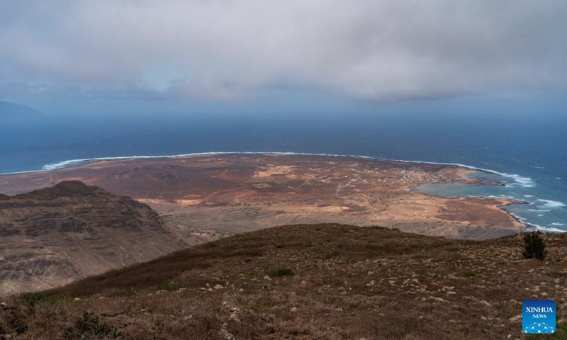 This photo taken on May 13, 2026 shows a coastal view of Sao Vicente Island, Cape Verde. Sao Vicente Island is located in the northwestern part of the Cape Verde archipelago. Characterized by volcanic mountains and arid hills, the island is best known for the port city of Mindelo and has become a popular tourist destination. (Xinhua/Xie Jianfei)

